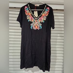 Brand new with tags tshirt dress with small side slit.